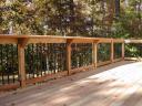 Cedar Deck and Rail with Deckorator pickets complimented by our signature shelf rail cap