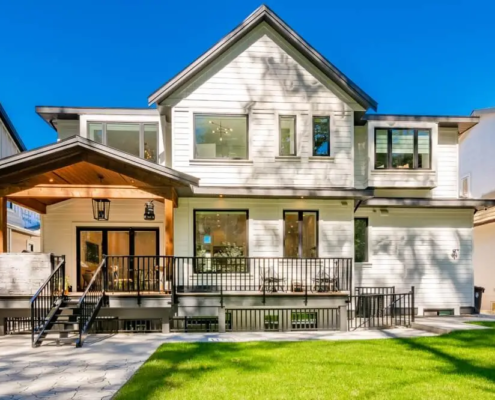 Classic home exterior with cement tile patio deck