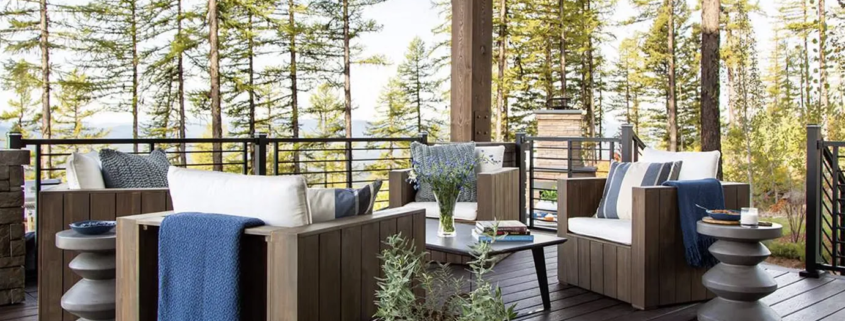 A beautiful modern home with a spacious covered porch, offering outdoor living space and protection.
