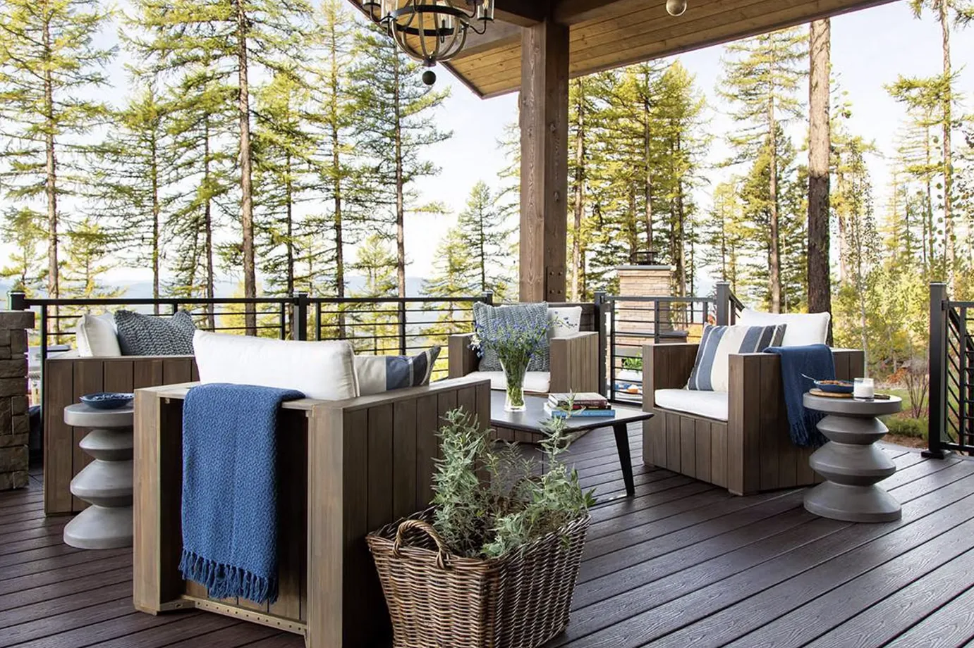 A beautiful modern home with a spacious covered porch, offering outdoor living space and protection.