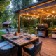 Beautifully designed backyard deck with pergola, string lights, outdoor dining table and grill in a lush metro Atlanta garden—showing the relaxing and family-friendly benefits of a well-planned outdoor living space.