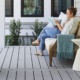 A beautiful, modern multi-level deck in a backyard setting